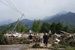 Heavy rains and flooding kill at least 34 people in and near Beijing